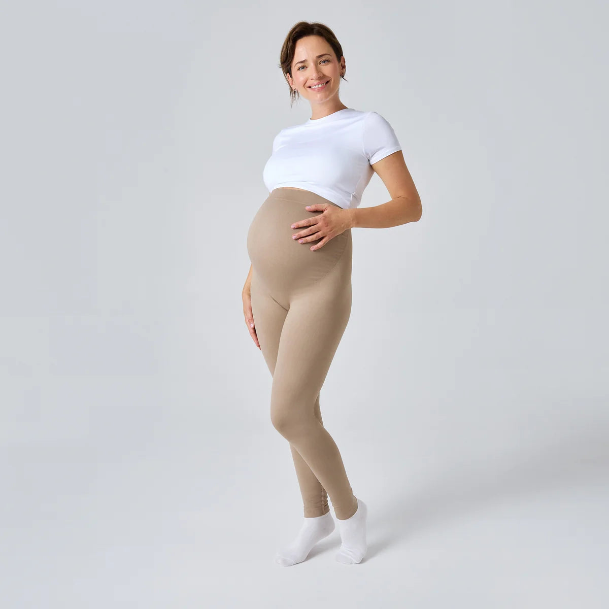 beige | Soulage le ventre et le dos | Le maillage spécial soutient doucement ton ventre de future maman et soulage ainsi le bas de ton dos.
